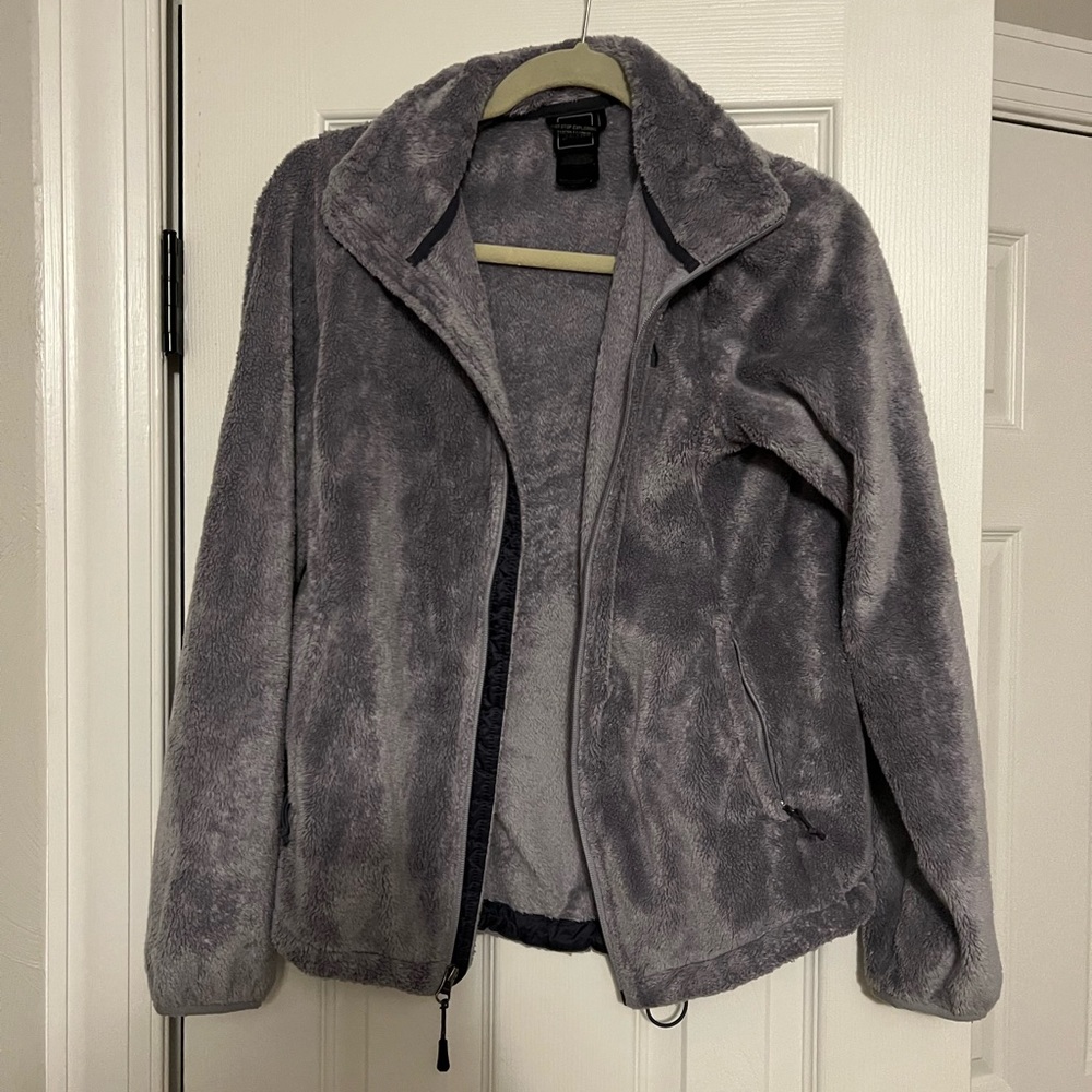 Grey The North Face fleece zip up jacket.